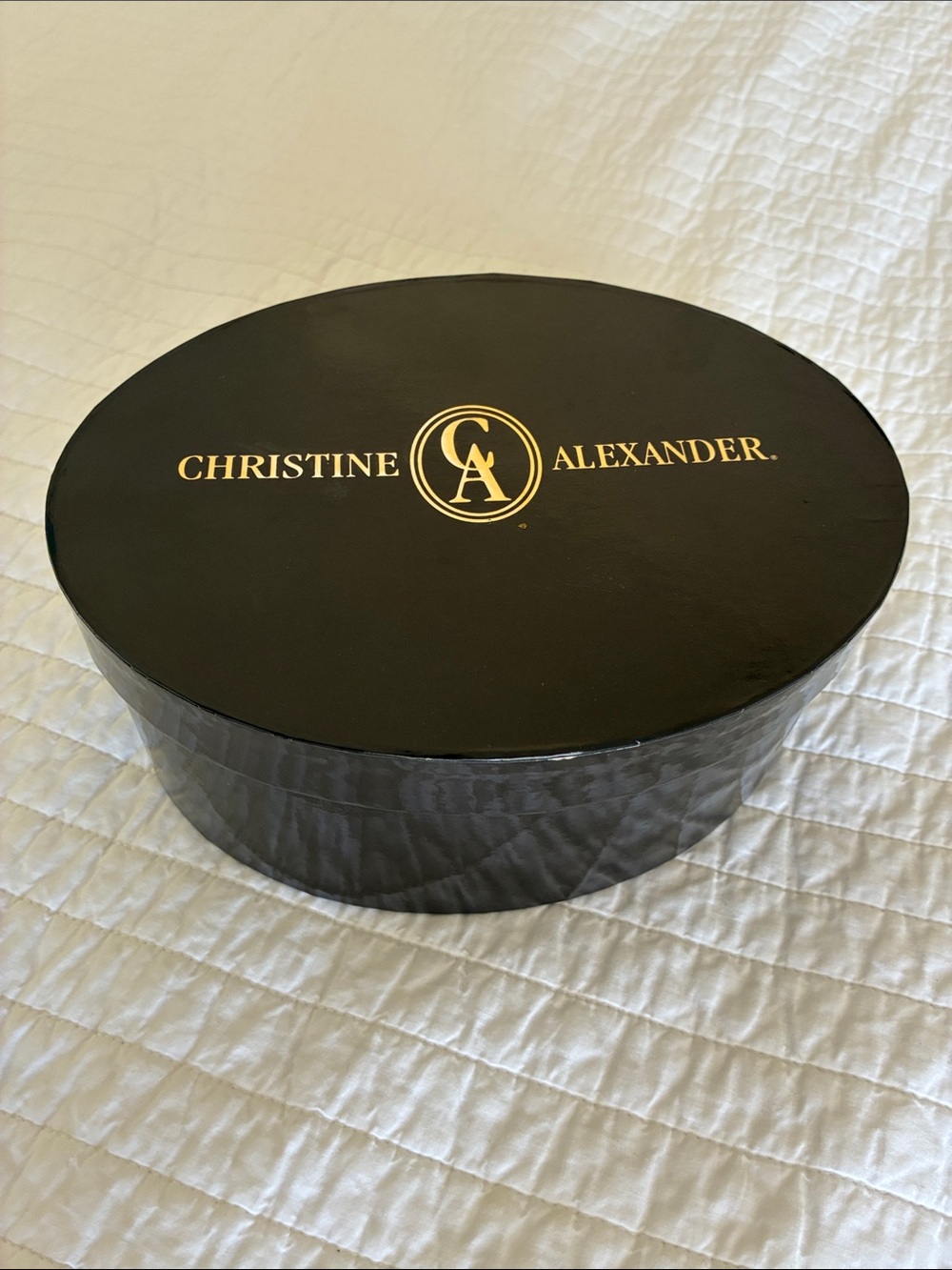 Christine Alexander Black Hat Box with Gold Logo